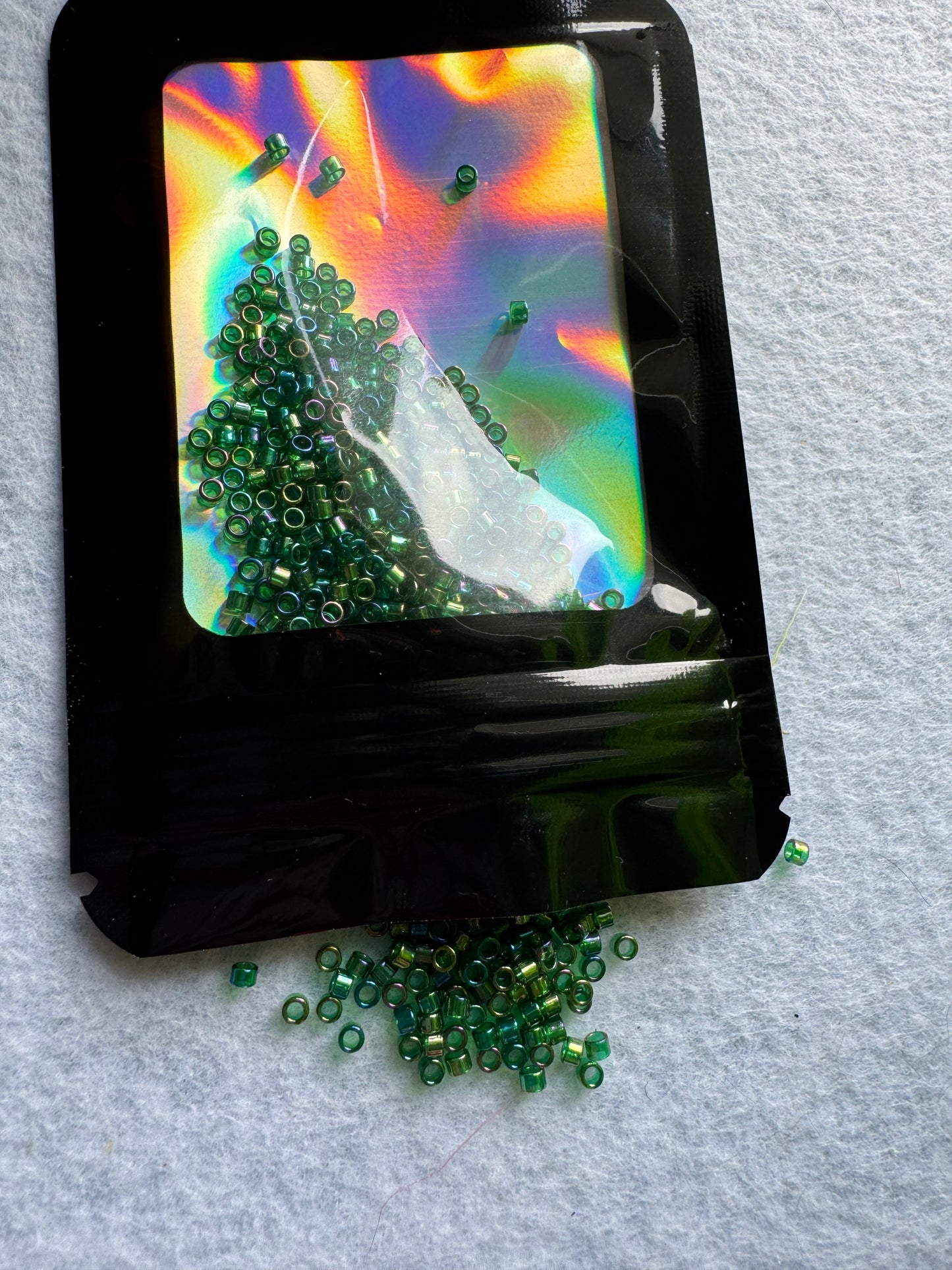 Delica size 8/0 Dark opal green