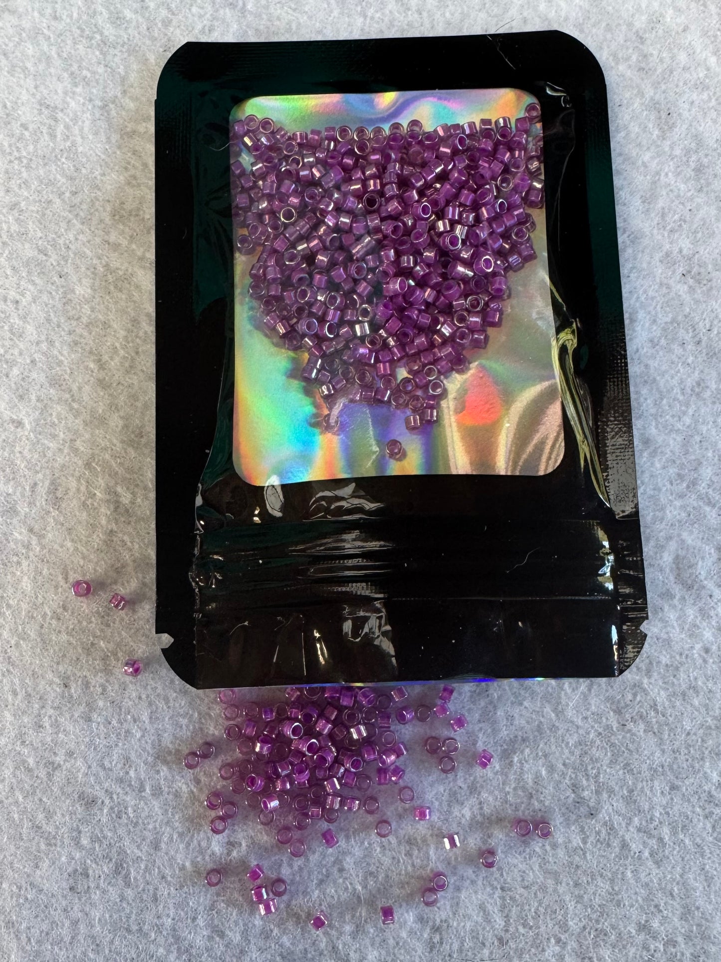 Delica 8/0 Dark opal purple